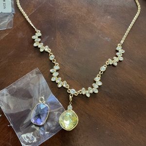 Stainless steal gold necklace with a second pice to switch when you want